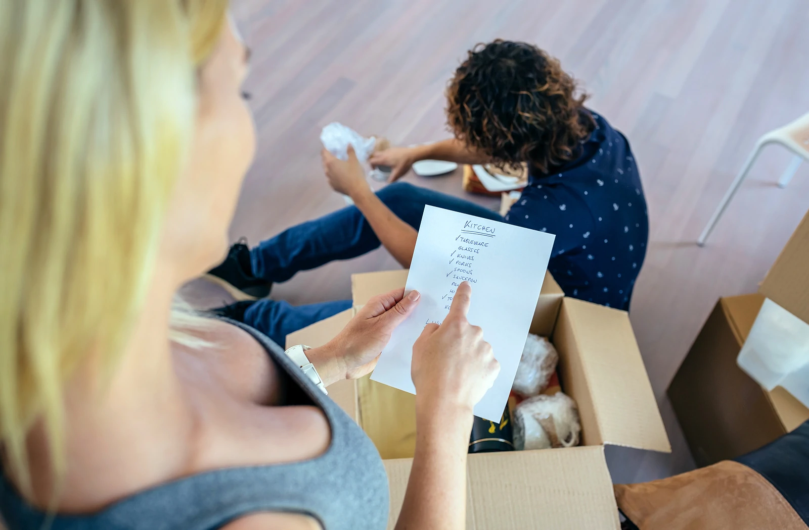 Woman looking at list